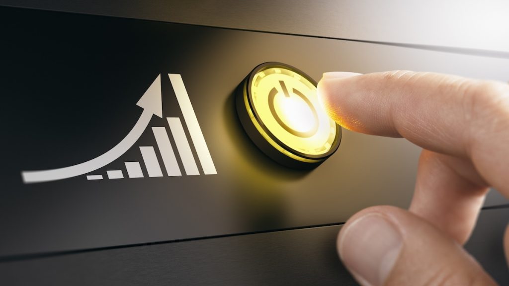 Image pressing a yellow start button to boost the traffic of a website. Concept of improving performance with SEO strategy.